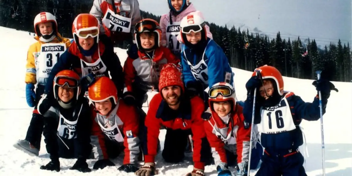 Quikies ski racing team posing at Mount Norquay, early 1980s.